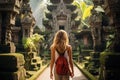 Young woman traveler in bali, indonesia. Travel concept, A tourist woman with a backpack on vacation, walking through the Hindu