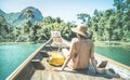 Young woman traveler on longtail boat trip at island hopping Royalty Free Stock Photo