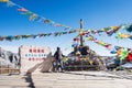 Young woman traveler traveling at Shika Snow Mountain or Blue Moon Valley in Zhongdian city Shangri-La. Yunnan, China. Chinese Royalty Free Stock Photo