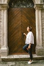 Young woman traveler walking through the city of Kotor, Montenegro