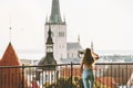 Young woman traveling in Tallinn city vacations in Estonia