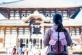 Young Woman traveling at Todaiji temple, Happy Asian traveler visit in Nara near Osaka. landmark and popular for tourists