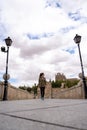 Young woman traveller walking through a bridge during a antumn afternoon