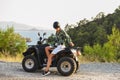 Young woman travelling quad on road in Fethiye, Mugla, Turkey