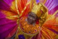 A young woman in Trinidad Carnival masquerade