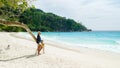 Young women at a tropical beach Petite Anse beach Mahe Seychelles Islands Royalty Free Stock Photo