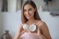 Young woman tryng a new soap with coconut oil