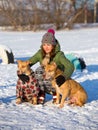 Young woman with two American Pit Bull Terrier winter