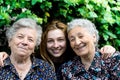 Young woman with two senior ladies Royalty Free Stock Photo