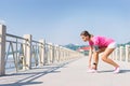 Young woman tying shoelace Royalty Free Stock Photo