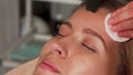 Young woman undergoing ultrasonic facial treatment at beauty salon Royalty Free Stock Photo