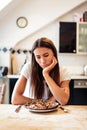 Young Woman Is Unhappy With Her Burnt Pizza For Lunch Royalty Free Stock Photo