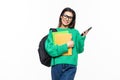 Young woman university student with backpack and books sending a sms on cell phone, isolated on white background Royalty Free Stock Photo