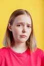 Young woman is upset. Closeup Emotional portrait of teenager girl with grimace of crybaby displeasure sad tired face. Sorry sad Royalty Free Stock Photo