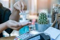 Young woman uses her hand to press hand sanitizer bottle to clean her hand. Hand sanitizer alcohol gel rub clean hands hygiene Royalty Free Stock Photo