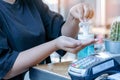 Young woman uses her hand to press hand sanitizer bottle to clean her hand. Hand sanitizer alcohol gel rub clean hands hygiene Royalty Free Stock Photo