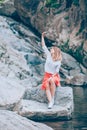 Young woman usin smartphone on the lake Royalty Free Stock Photo