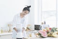 Young woman using a blender in the kitchen Royalty Free Stock Photo