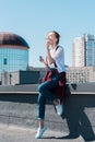 young woman using bubble blower Royalty Free Stock Photo