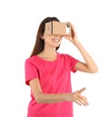 Young woman using cardboard virtual reality headset Royalty Free Stock Photo