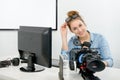 Young woman using computer for video editing Royalty Free Stock Photo