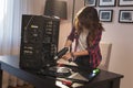 Young woman using electrical screwdriver to fix a computer Royalty Free Stock Photo