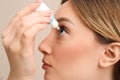 Young woman using eye drops, closeup Royalty Free Stock Photo