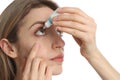 Young woman using eye drops on white background, closeup Royalty Free Stock Photo