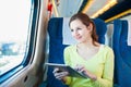 Young woman using her tablet computer