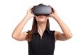 Young woman using and holding VR headset on head, isolated Royalty Free Stock Photo