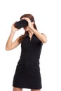 Young woman using and holding VR headset on head, looking away, isolated Royalty Free Stock Photo