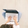 Young woman using laptop. Top view girl hands at computer keyboard. Lifestyle Royalty Free Stock Photo