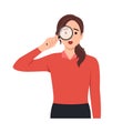 Young woman using magnifying glass and pointing finger. Searching internet data concept