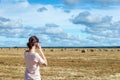 Young woman using mobile phone outdoors Royalty Free Stock Photo