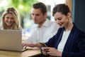 Young woman using mobile phone Royalty Free Stock Photo