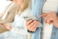 Young woman using modern smartphone indoors Royalty Free Stock Photo