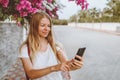 Young woman using smartphone application online shopping modern technology