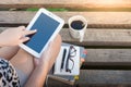 Young woman using smartphone in park Royalty Free Stock Photo