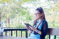 Young woman using tablet in coffee shop