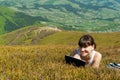 Young woman using tablet computer outdoors Royalty Free Stock Photo