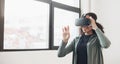 Young woman using virtual reality headset at home panoramic banner, VR, future gadgets, technology, virtual event Royalty Free Stock Photo