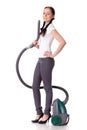 Young woman with vacuum cleaner.