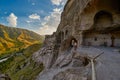 Young woman in Vardzia Cave Monastery of Georgia