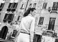 Young woman in venice, italy against old buldings