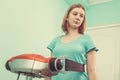 Young woman on vibration trainer Royalty Free Stock Photo