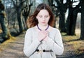 Young woman in vintage dress praying Royalty Free Stock Photo