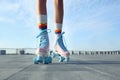 Young woman with vintage roller skates on sunny day, closeup view