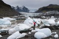 Young woman visiting nature landscape in Iceland glacier