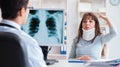 The young woman visiting radiologist for x-ray exam Royalty Free Stock Photo