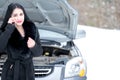 Young woman waiting for help or assistance after her car breakdo Royalty Free Stock Photo